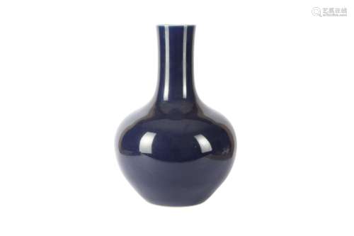 A CHINESE BLUE-GLAZED BOTTLE VASE, TIANSHOUPING.