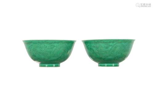 A PAIR OF CHINESE INCISED GREEN-GLAZED 'DRAGON' BO...