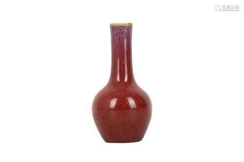 A SMALL CHINESE FLAMBÉ BOTTLE VASE.