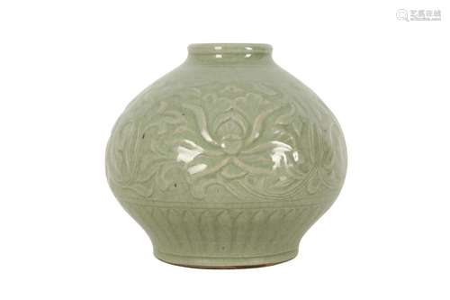 A CHINESE INCISED CELADON JAR.