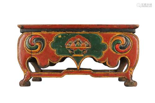 A TIBETAN POLYCHROMED WOOD ALTAR TABLE.