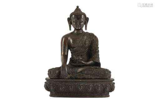 A BRONZE FIGURE OF BUDDHA SAKYAMUNI.