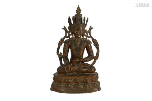 A TIBETAN LACQUERED AND GILT-BRONZE FIGURE OF BUDDHA SAKYAMU...