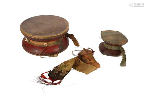 TWO TIBETAN DAMARU DRUMS.