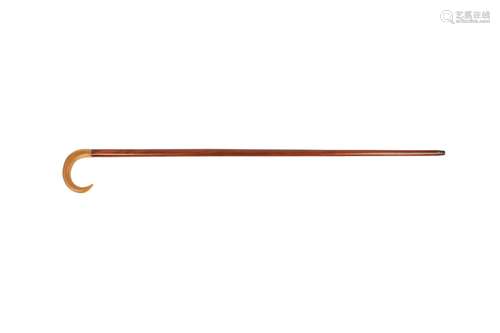 λ A WALKING STICK WITH A RHINOCEROS HORN HANDLE.