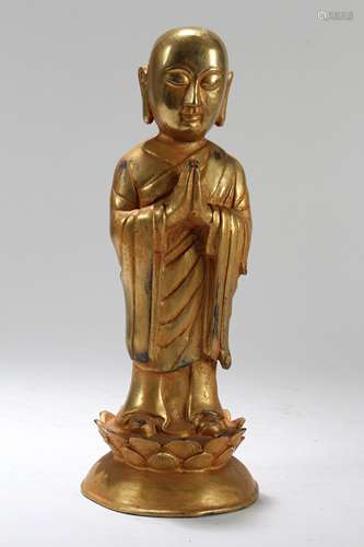 A Chinese Gilt Religious Fortune Buddha Statue