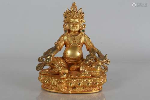 A Chinese Gilt Religious Fortune Statue