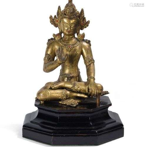 Statuette en bronze doré, représentant un boddhisattva assis...