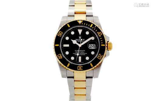 ROLEX SUBMARINER STAINLESS STEEL AND 18K YELLOW GOLD.