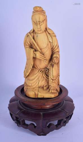 A 17TH/18TH CENTURY CHINESE CARVED IVORY FIGURE OF A