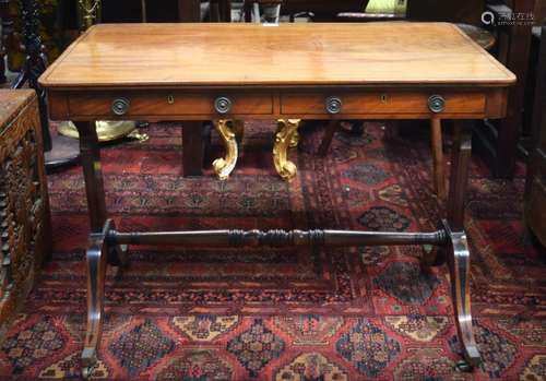 A REGENCY SOFA TABLE with faux drawers and arched legs.