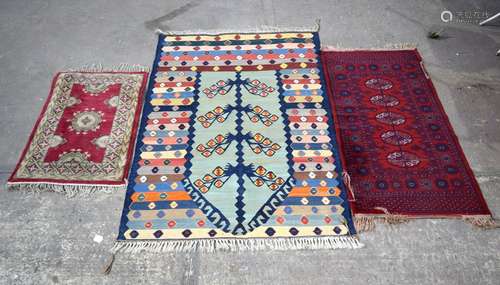 THREE CONTINENTAL RUGS OF VARIOUS SIZES. Largest 166 x