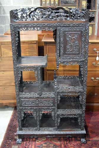 A 19TH CENTURY CHINESE CARVED DISPLAY CABINET Qing,