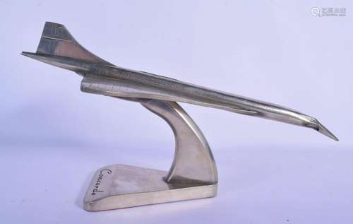 A VINTAGE 1970S CHROME CONCORDE MODEL upon a triangular