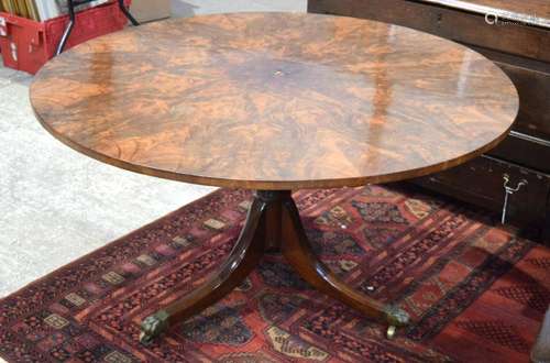 AN ANTIQUE MAHOGANY TILT TOP TABLE with a veneered well