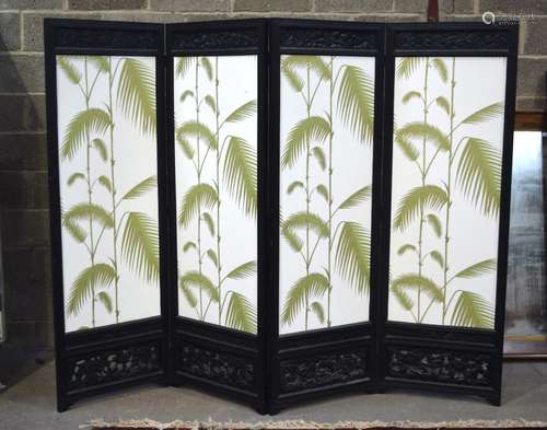 A LARGE ORIENTAL FOUR FOLD SCREEN, decorated with green