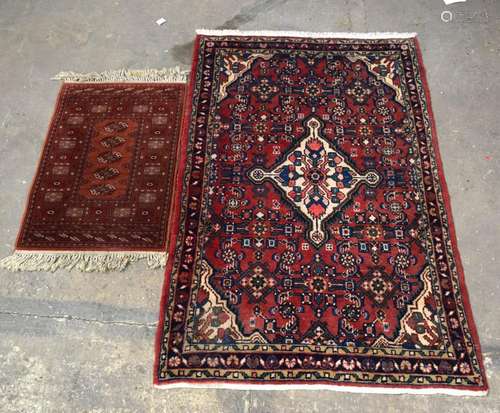 TWO RED GROUND CARPETS of various size and design. 175