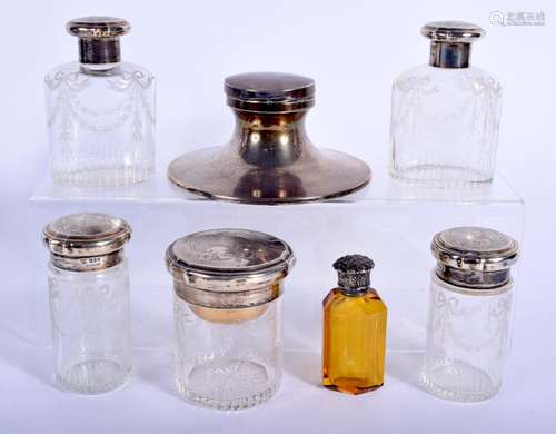 FIVE ANTIQUE SILVER TOPPED DRESSING TABLE JARS together