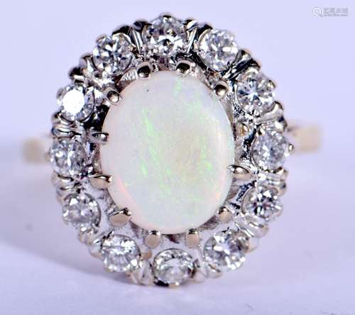 A FINE 18CT GOLD DIAMOND AND OPAL RING. Birmingham