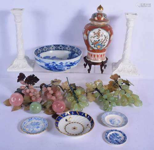 A PAIR OF ROYAL WORCESTER CANDLESTICKS together with a