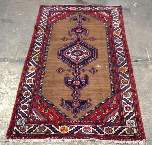 A RED AND BROWN GROUD CARPET with blue geometric shaped