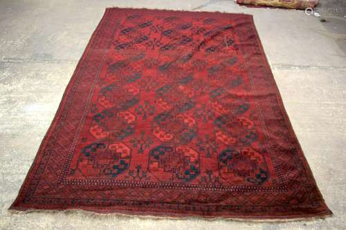 A FINE LARGE CONTINENTAL RICH RED GROUND RUG, finely