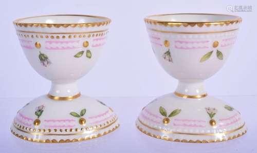 A PAIR OF ROYAL COPENHAGEN FLORA DANICA POR…