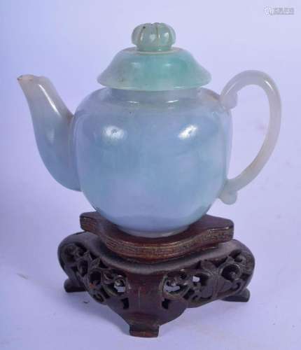 A FINE EARLY 20TH CENTURY CHINESE CARVED ICEY JADEITE