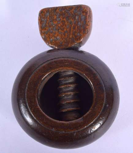 AN ANTIQUE TREEN FRUITWOOD SCREW ACTION NUT …