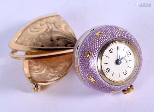 A FINE EDWARDIAN SILVER GILT AND ENAMEL WATCH FORM FOB