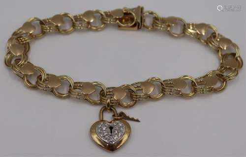 JEWELRY. 14kt Gold Charm Bracelet and Charm.
