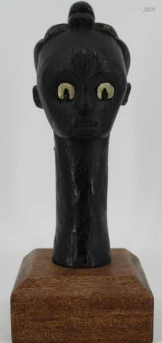 Antique African reliquary head On Stand .