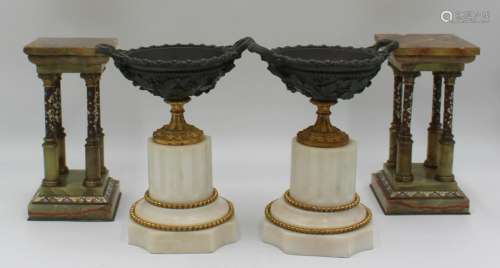 An Antique Pair Of Bronze Urns On Marble Bases