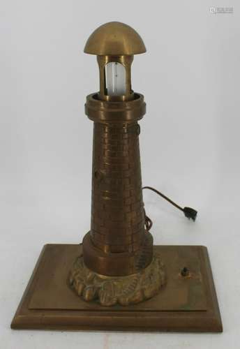 A Large Brass Machined Lighthouse Table Lamp