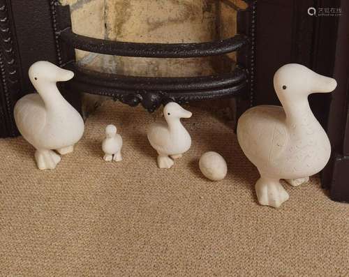 GROUP OF 4 UNGLAZED CERAMIC DUCKS