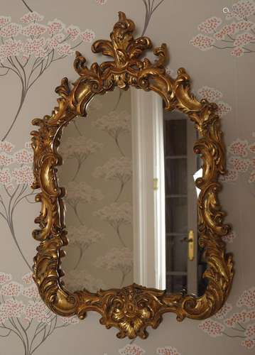 CARVED GILT WOOD FRAMED VANITY MIRROR