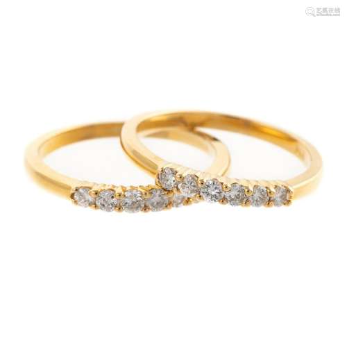 A Matched Pair of 14K Diamond Bands