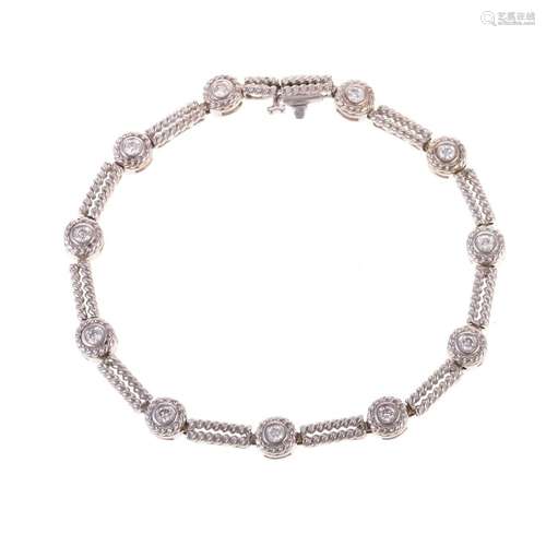 A 14K White Gold Bezel Set Diamond Link Bracelet