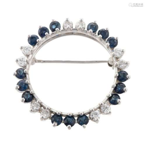 A 14K Circle Brooch with Diamonds & Sapphires