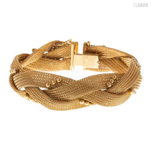 A Statement Wide Braided Bracelet in 18K