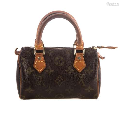 A Louis Vuitton Monogram Mini Speedy