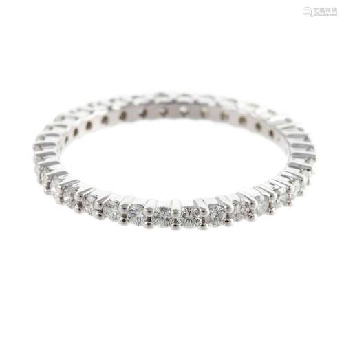 A Delicate Diamond Eternity Band in 14K