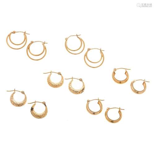 A Collection of 14K Petite Hoop Earrings