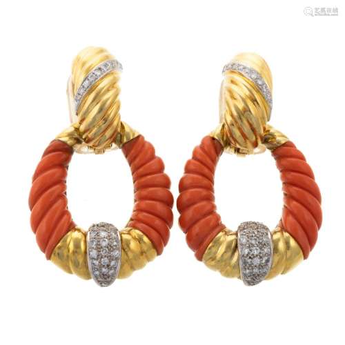 A Pair of 18K Yellow Gold Carved Coral Earrings