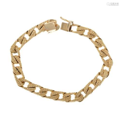 A Textured Curb Link Bracelet in 14K