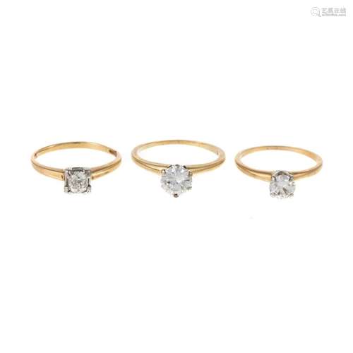 A Trio of Diamond Solitaire Rings in Gold