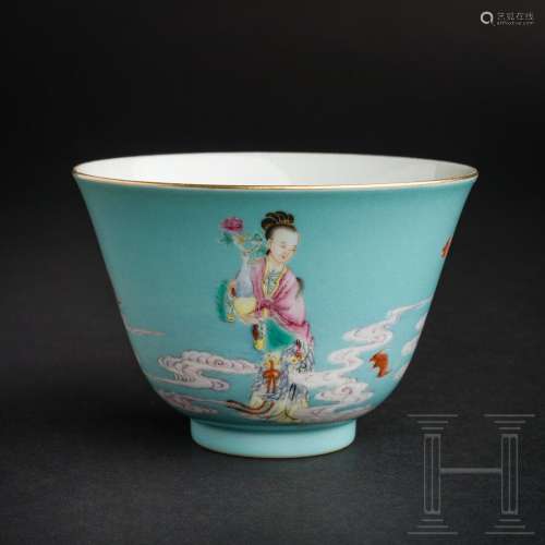 A figurally decorated blue-ground famille rose cup with