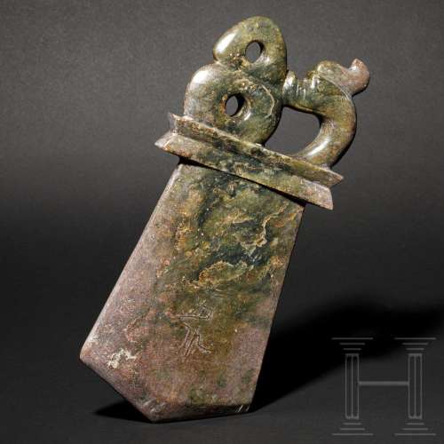 A large Chinese jade ritual axe with inscription,