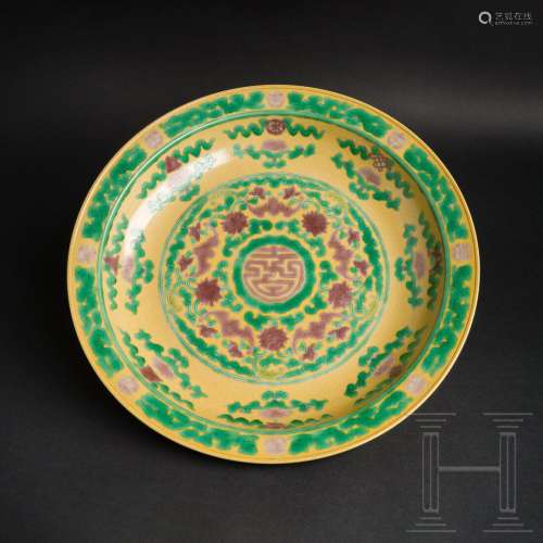 A yellow-ground green- and aubergine-decorated dish