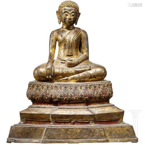 A gilded Thai bronze figure of the Buddha disciple